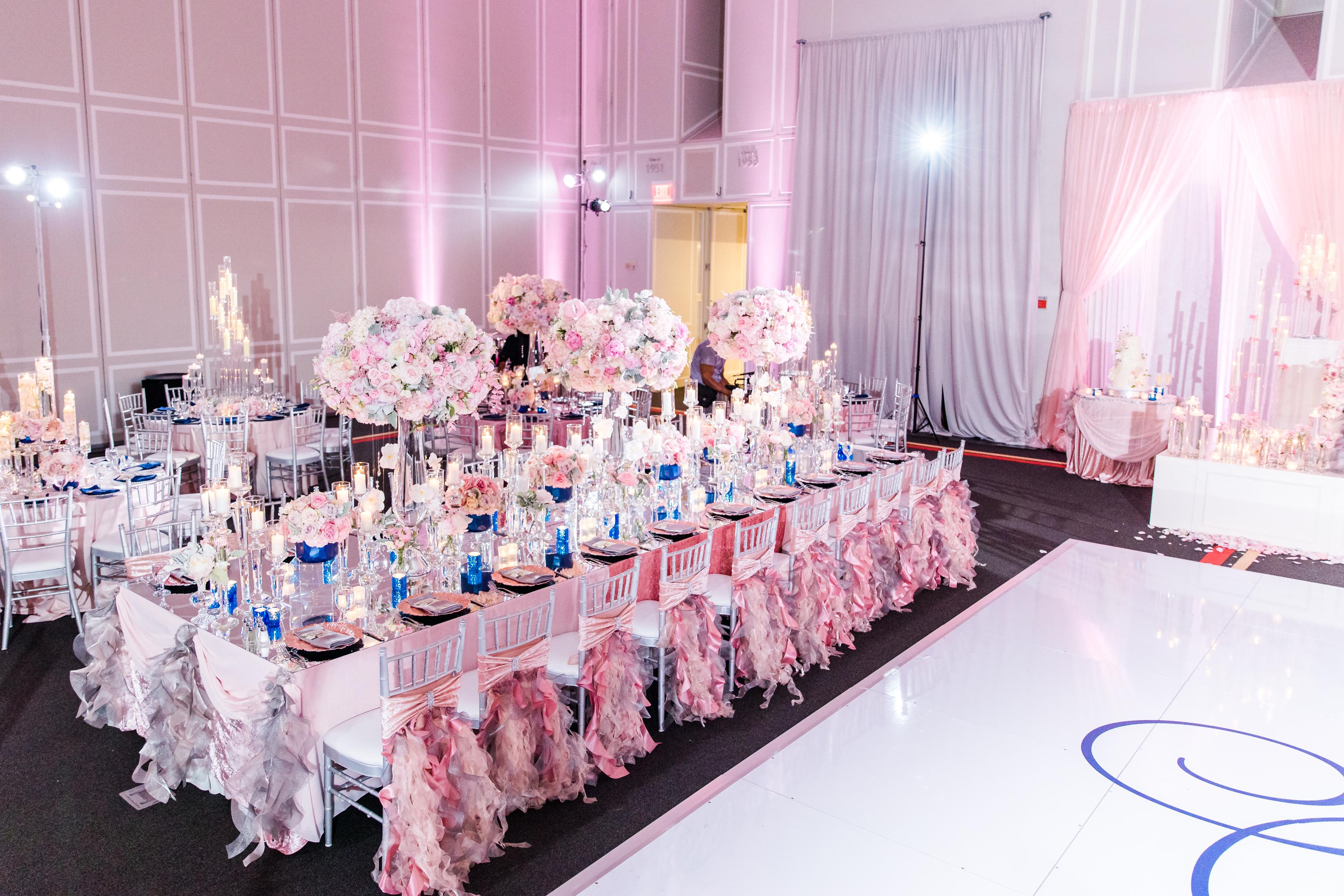 Dance floor and kings table draped in pink, white and blue