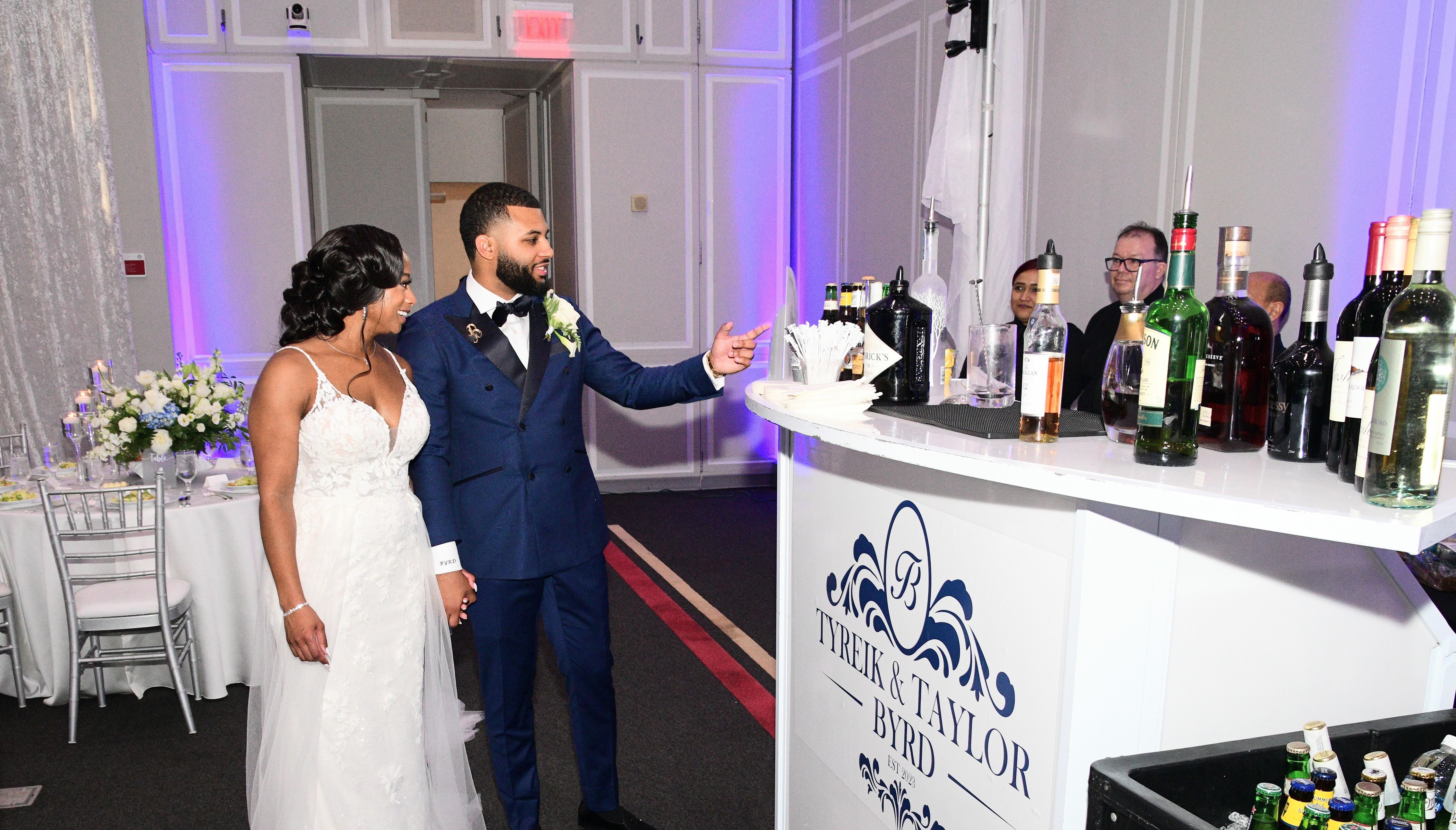 Bride & Groom with bar setup