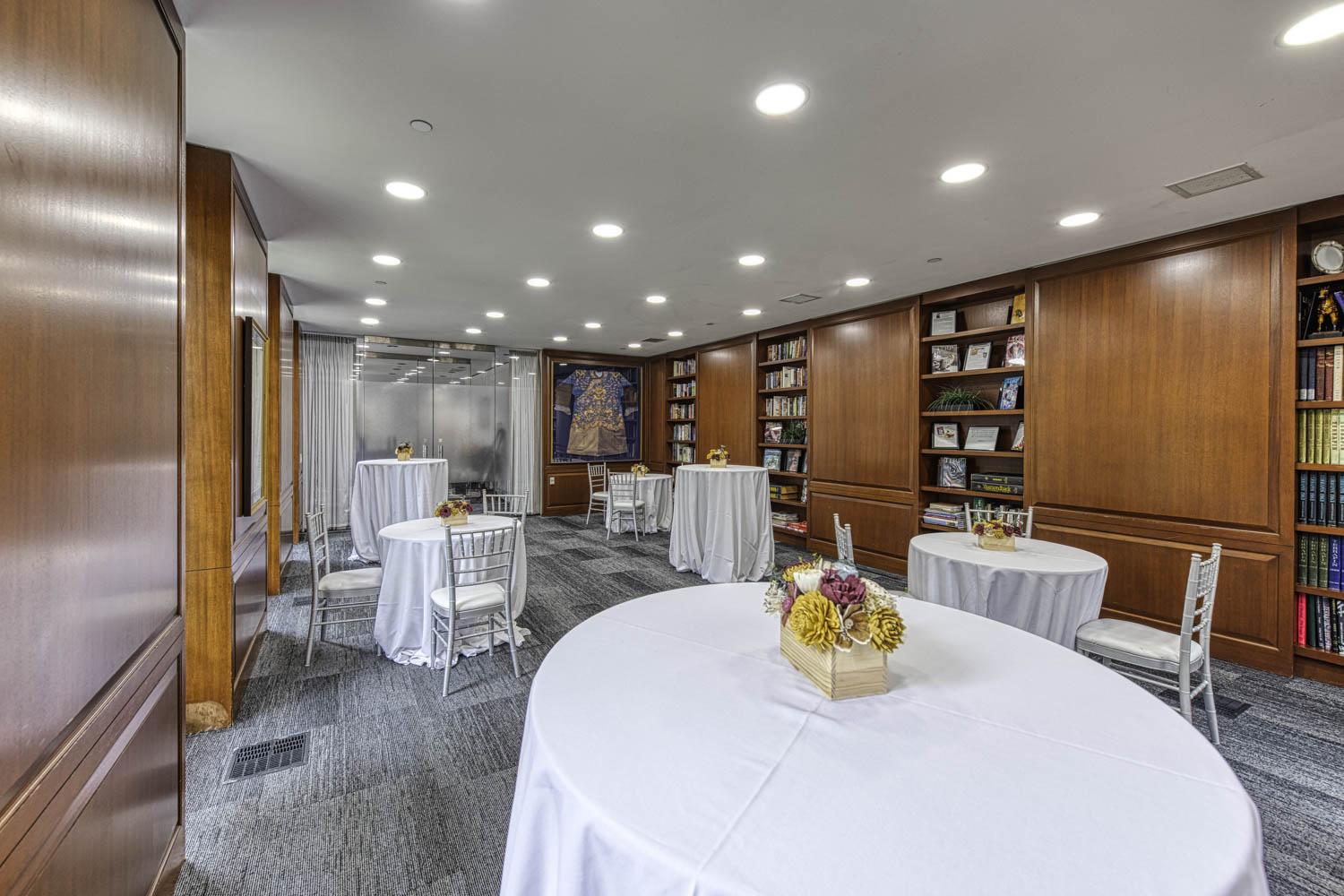 Chaney with white banquet tables